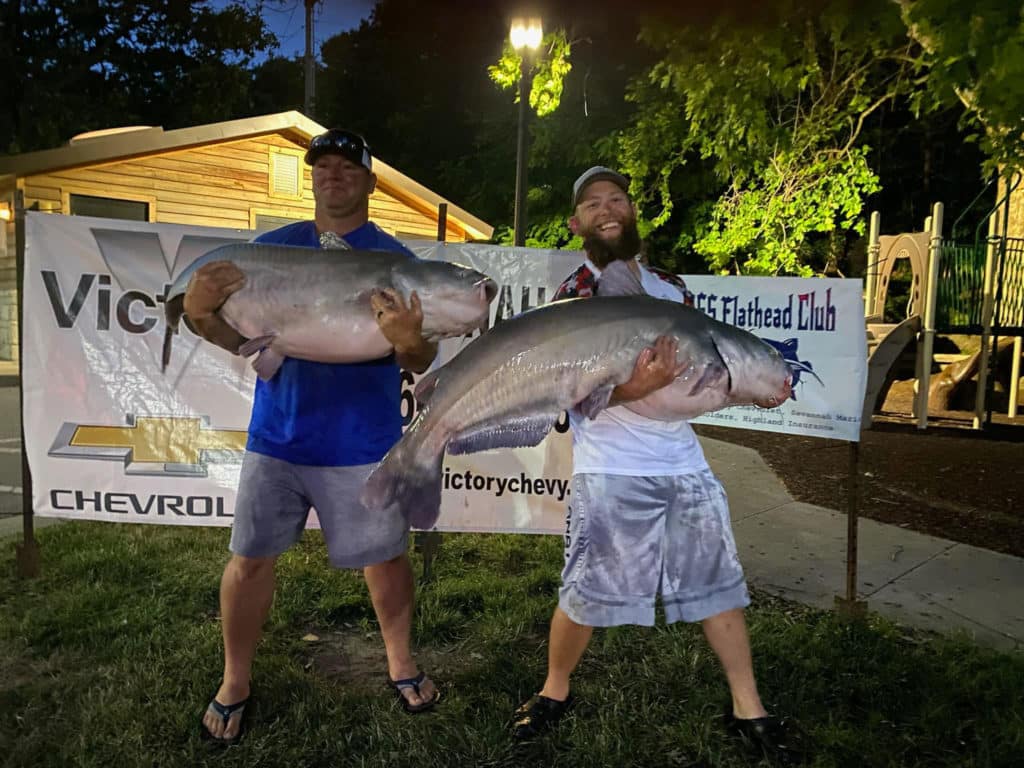 Anglers with winning catfish