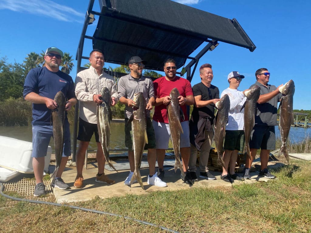 Anglers with cobia