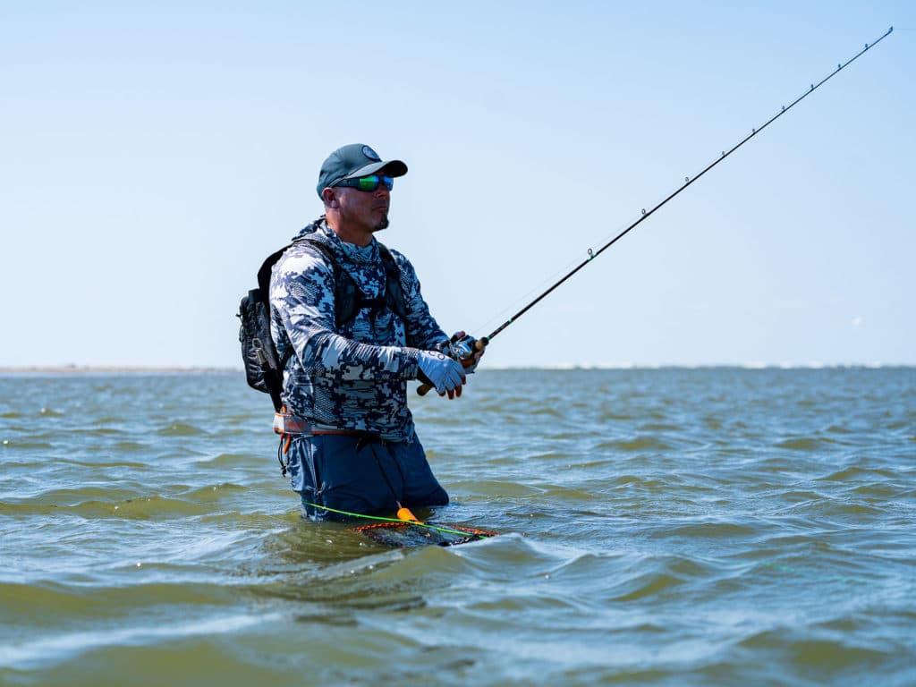 Angler using Shimano baitcaster