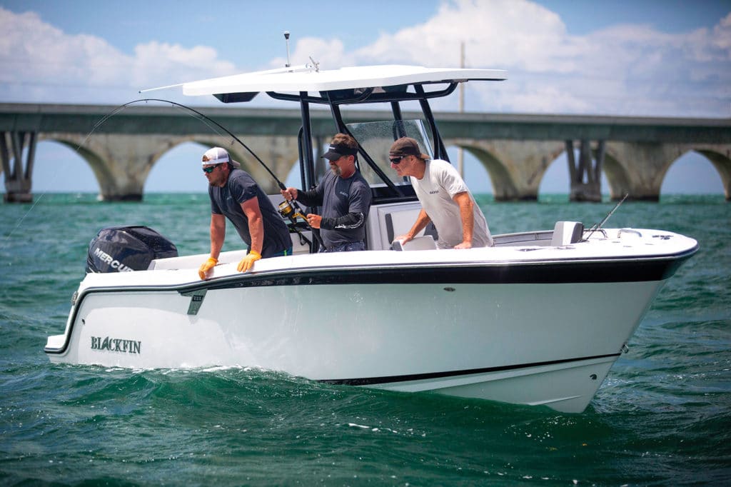 Anglers fighting fish