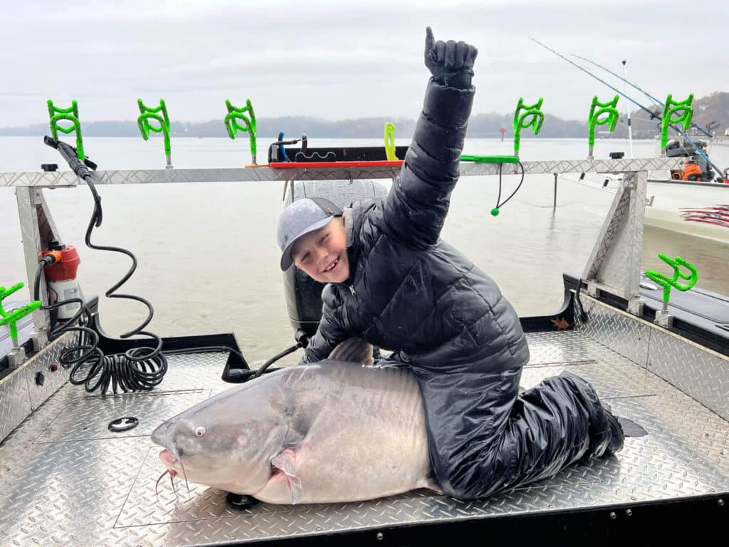 Luke Langley and a blue catfish