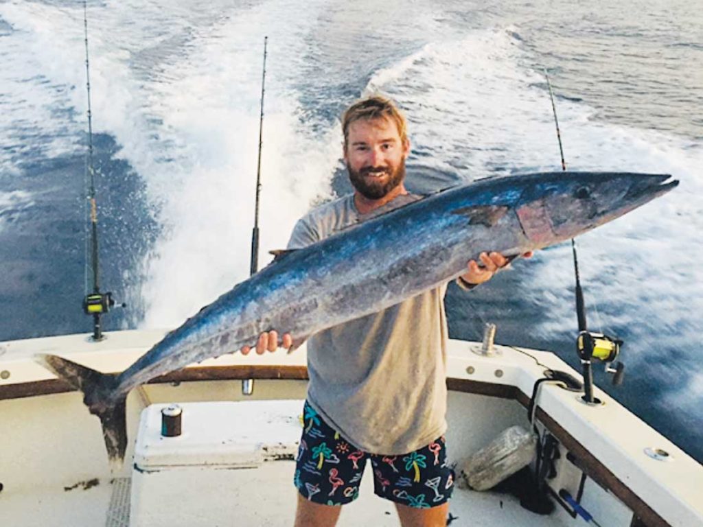 Angler with kingfish