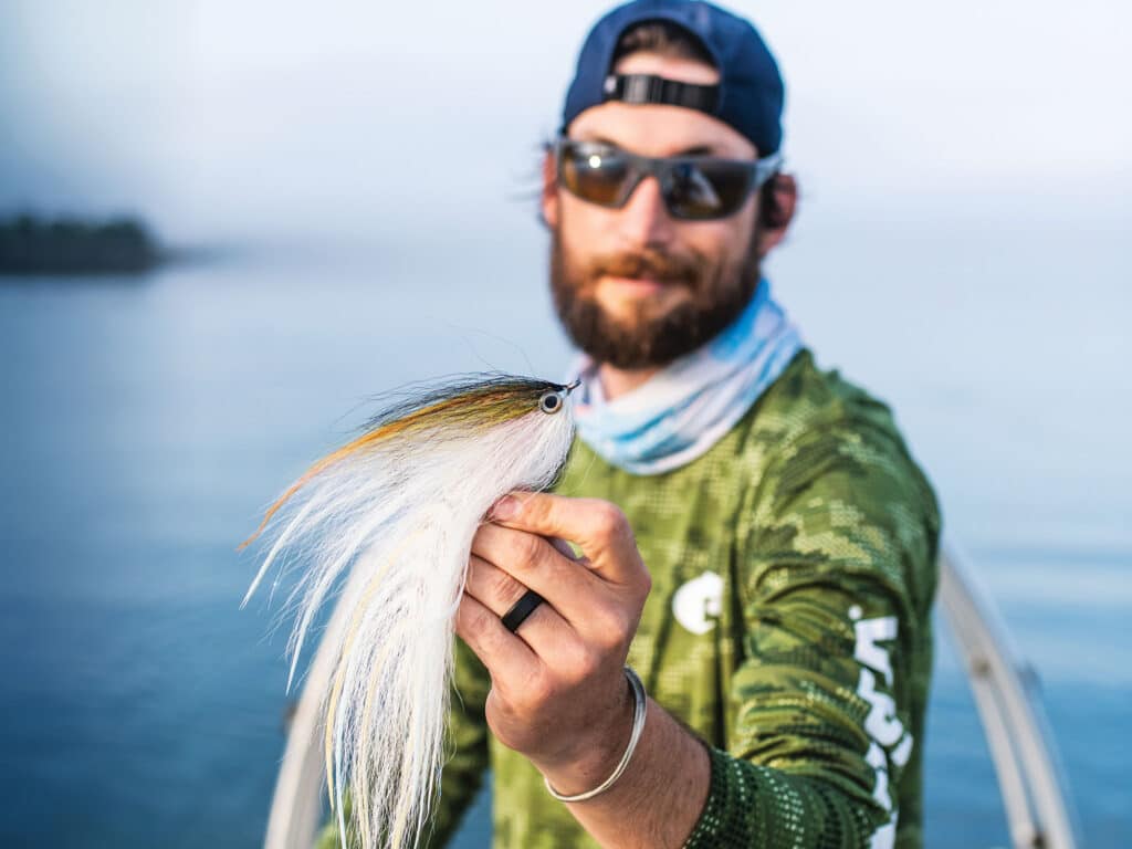 Ben Whalley holding a fly