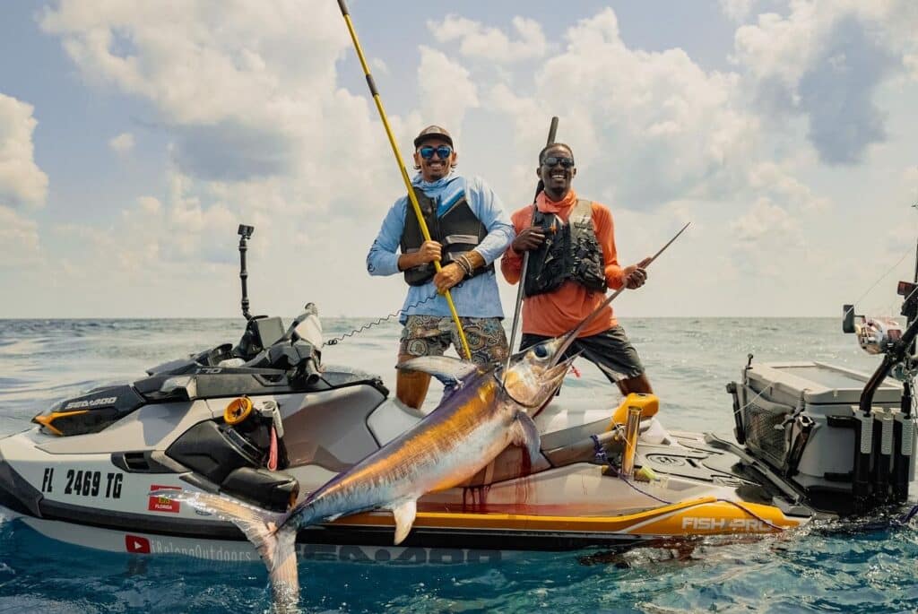 Emmanuel Williams and Sebastian Noel with swordfish