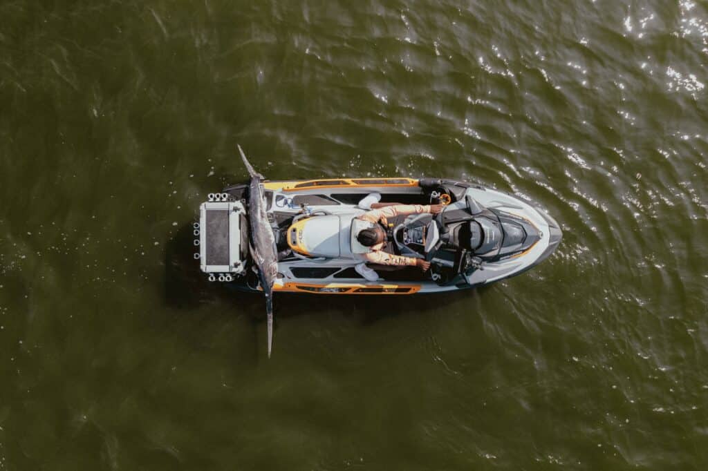 swordfish on back of jet ski