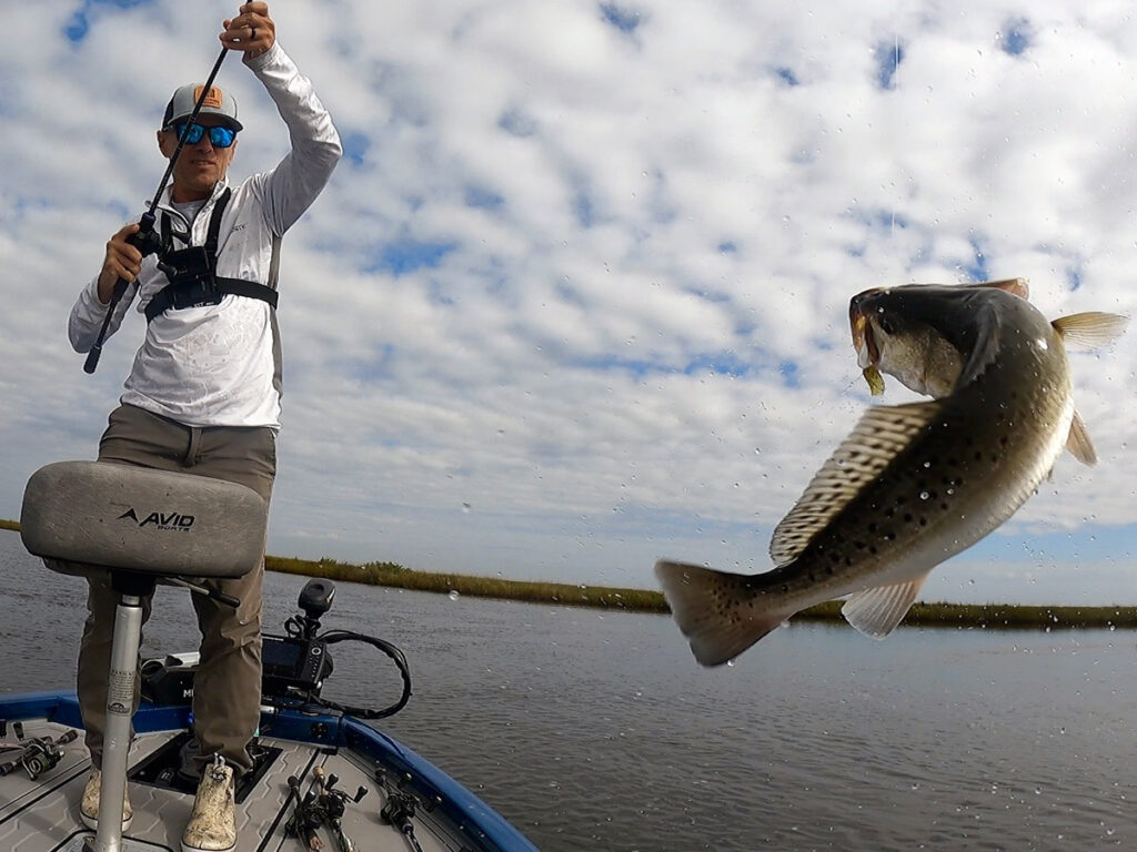 boat flipping a speckled trout