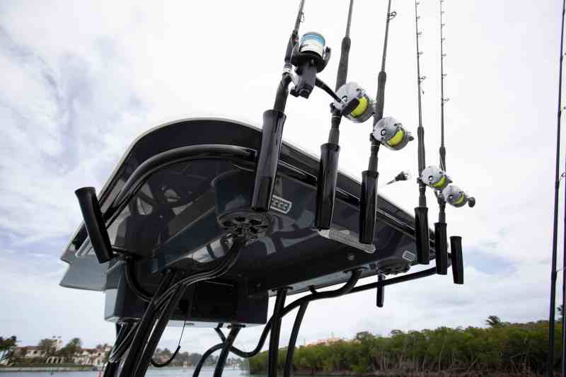 The hardtop features numerous rod holders