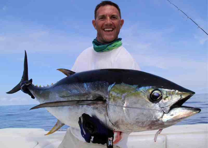 Panama fishing captain holding Chiriqui tuna
