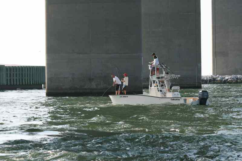 Bridge fishing from a boat