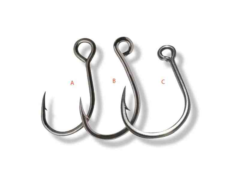 Three saltwater in-line single fishing hooks used to switch out treble hooks on fishing lures