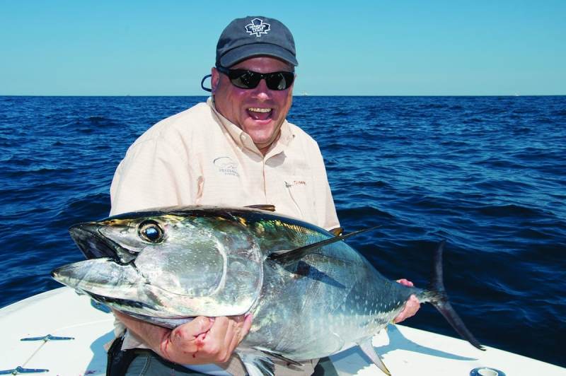 Angler holding bluefin tuna