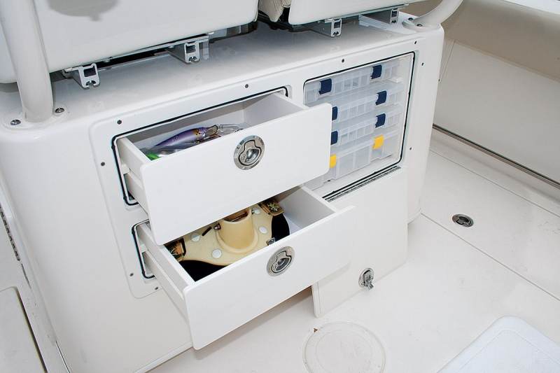 Cobia 261CC center console saltwater fishing boat abaft tackle storage