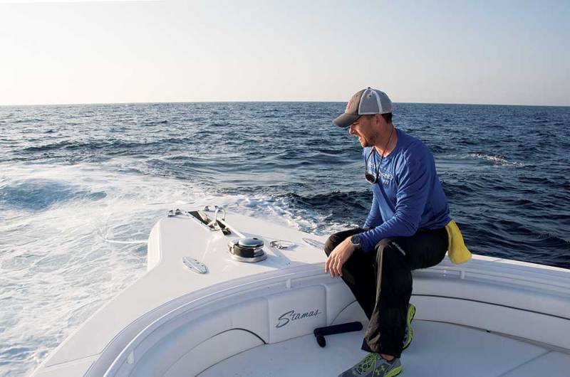 angler aboard Stamas 392 Tarpon center-console offshore saltwater fishing boat