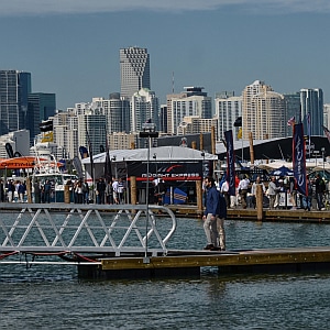 The skyline of downtown Miami shadows over rows and rows of docked boats during the Maimi International Boat Show at the Maimi Marine Stadium.