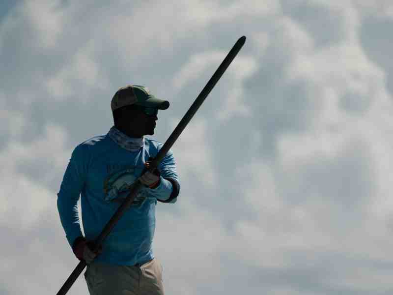 SPF0722-Inshore-Poling Angler poling skiff