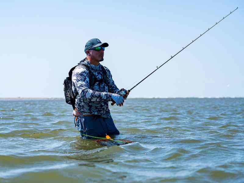 Angler using Shimano baitcaster