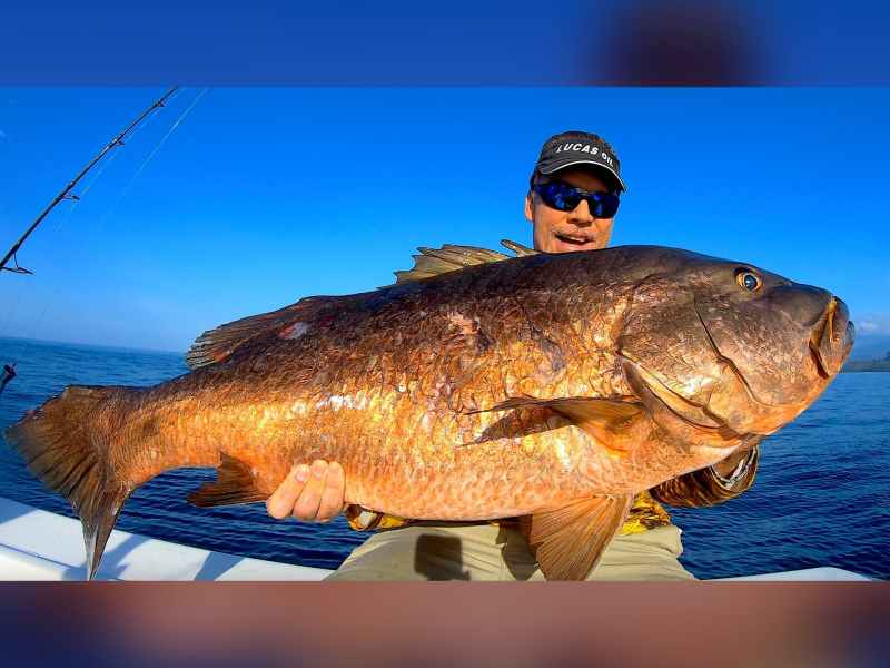 Sportfishing-Cubera Mark Davis with his giant of a cubera snapper.