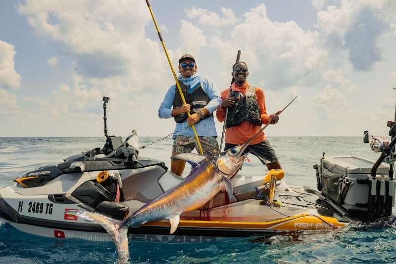 Emmanuel Williams and Sebastian Noel with swordfish Emmanuel Williams and Sebastian Noel with swordfish