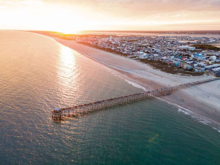SPF0723-TAA-Crystal-AdobeStock-430624956 Oceanana Fishing Pier at sunset North Carolina Crystal Coast at Atlantic Beach