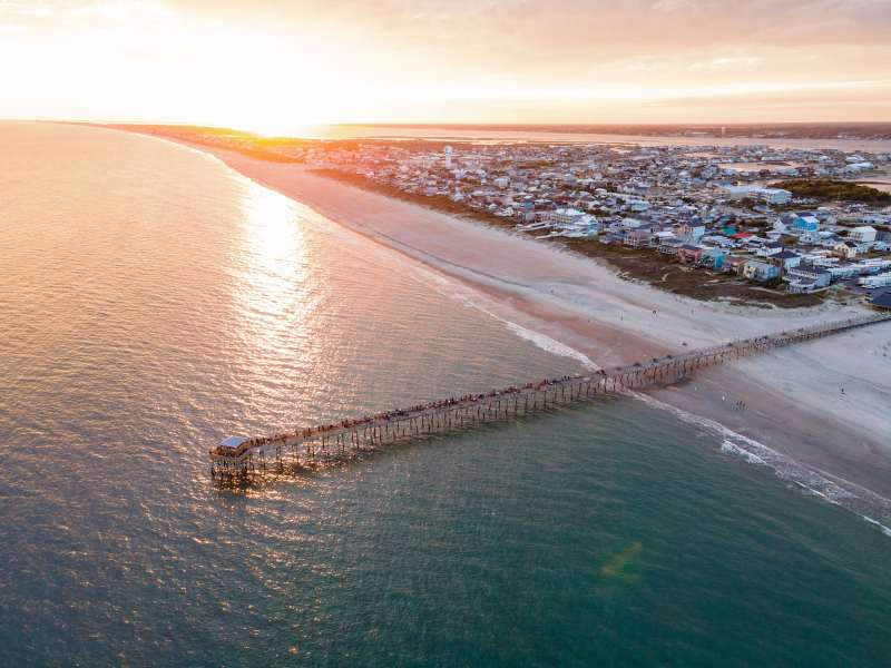SPF0723-TAA-Crystal-AdobeStock-430624956 Oceanana Fishing Pier at sunset North Carolina Crystal Coast at Atlantic Beach
