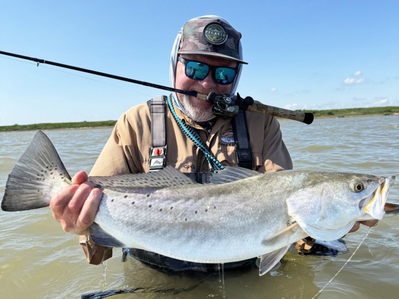 Capt. Charlie Paradoski holds a nice seatrout caught on the Texas flats.