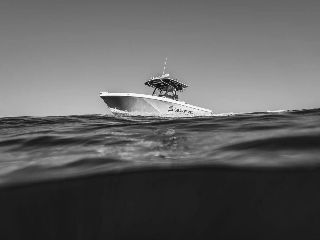 Center-console boat at sea using Seakeeper
