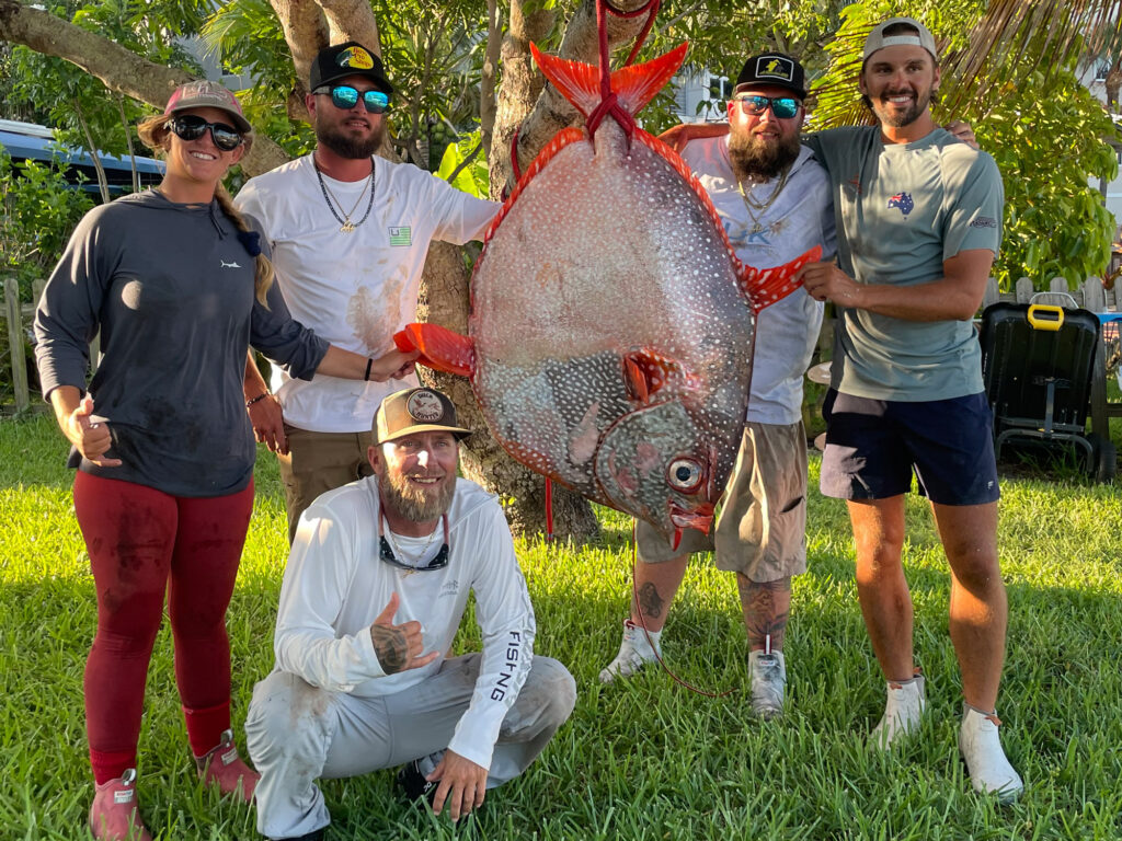Anglers with a rare 148-pound opah caught off South Florida.