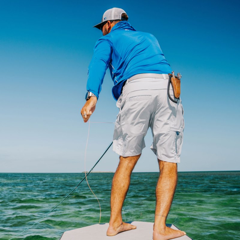 Angler wearing Costa Fly Line casting