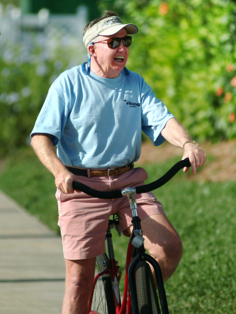 Bill Healey of Viking Yachts on a bicycle.