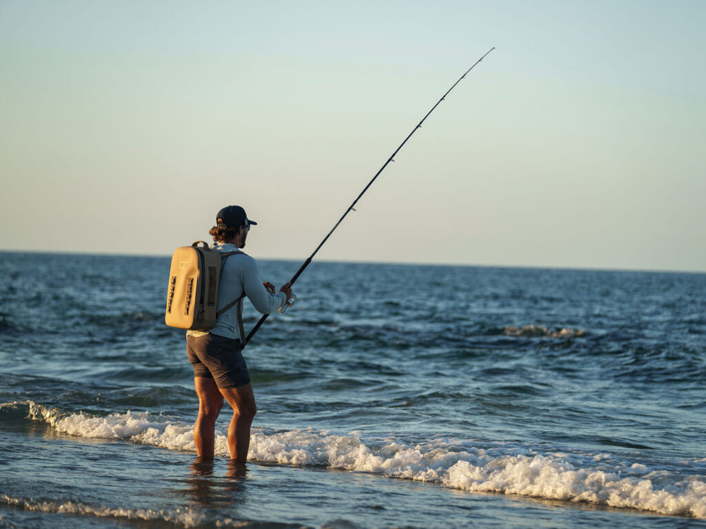 Angler fishing from the beach