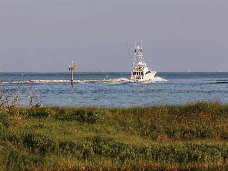 Charter fishing boat heading offshore