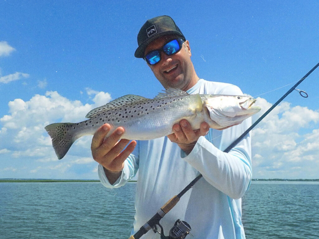 Angler with speckled trout along the Crystal Coast