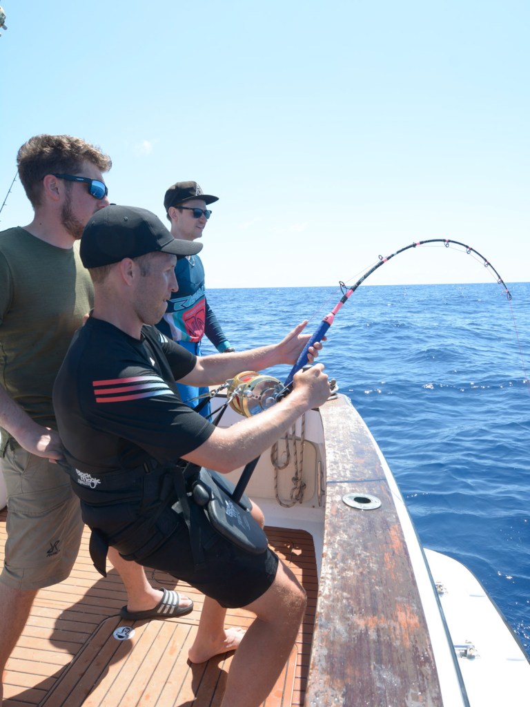 Angler fighting a tuna in the Mediterranean