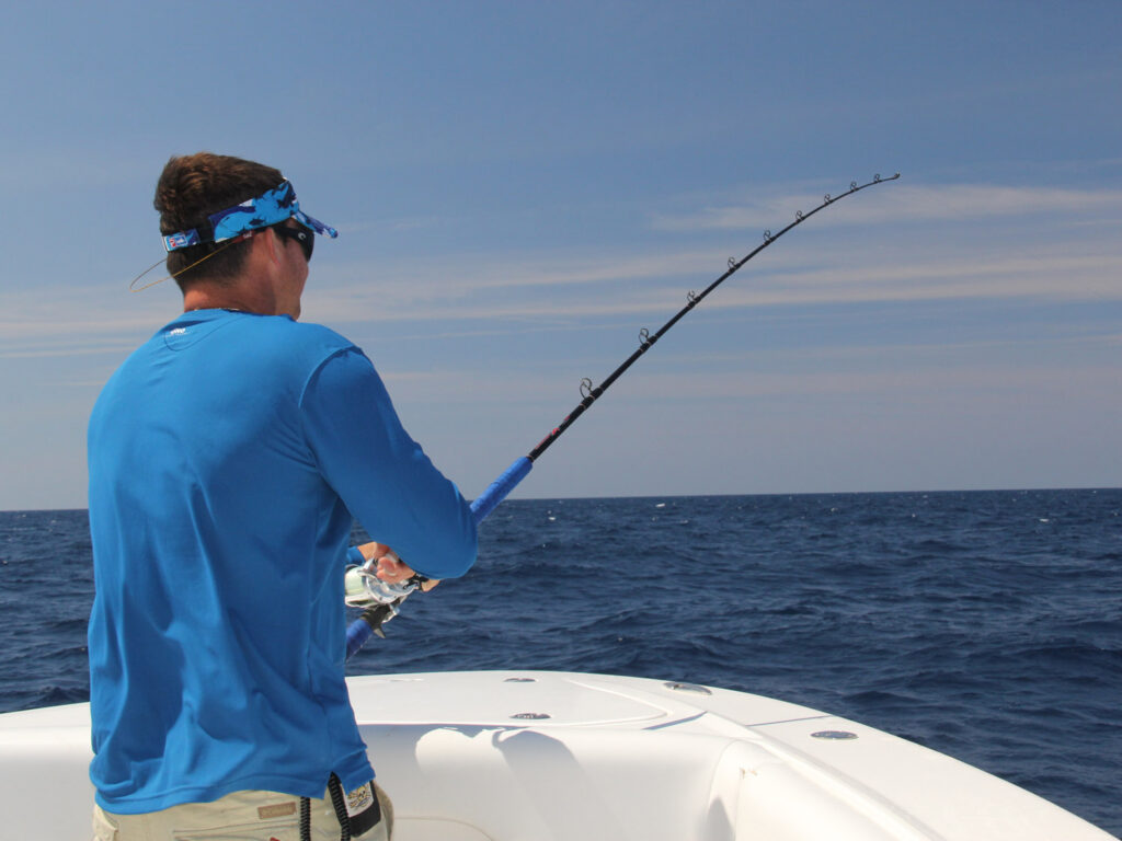 Angler fishing for kingfish