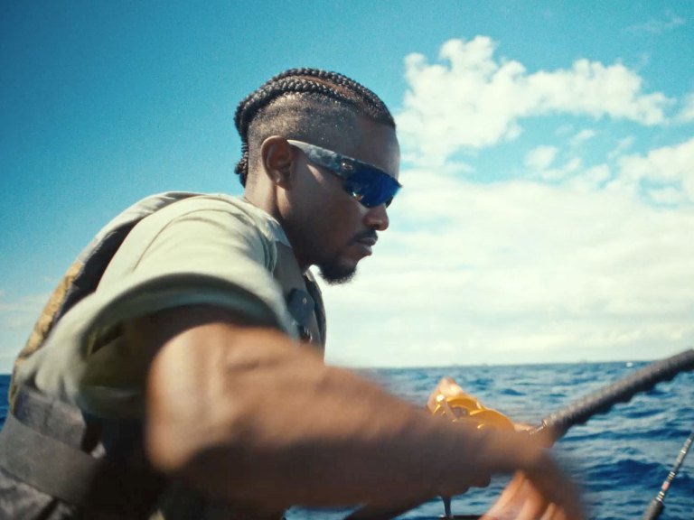Wearing Costa sunglasses while fishing offshore