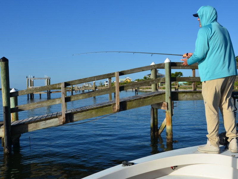 Angler fishing docks